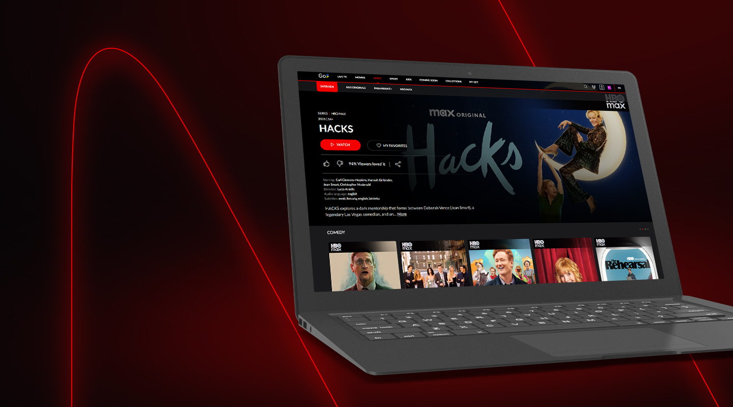 laptop showing Hacks series on a black red background