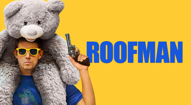 vyras su lokiu ant galvos ir pistoletu