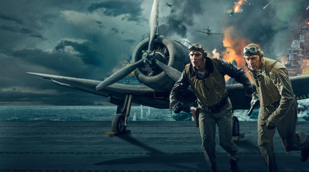 men running from a burning plane